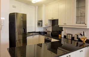 Luxury Apartment, 3 Bedrooms, Sea View, Sea Facing | Private kitchen | Full-size fridge, microwave, oven, stovetop