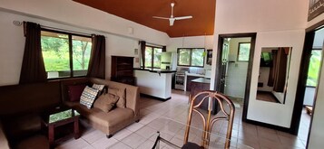 Superior Apartment, 1 Bedroom, Balcony, Poolside (3-7) | Living area | 32-inch flat-screen TV with cable channels, TV