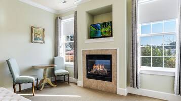 Romantic Room, 1 King Bed, Fireplace, Garden View | Living area | 42-inch flat-screen TV with cable channels, TV