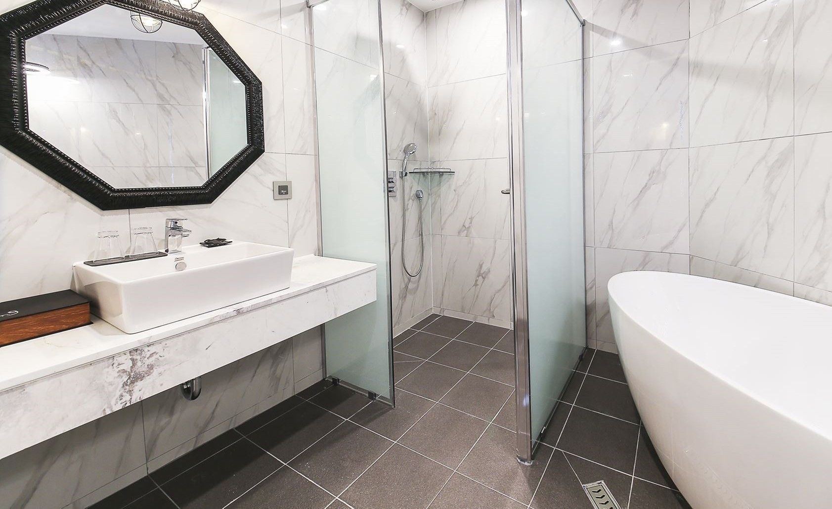 customized suite | bathroom | separate bathtub and shower, free toiletries, hair dryer, bathrobes
