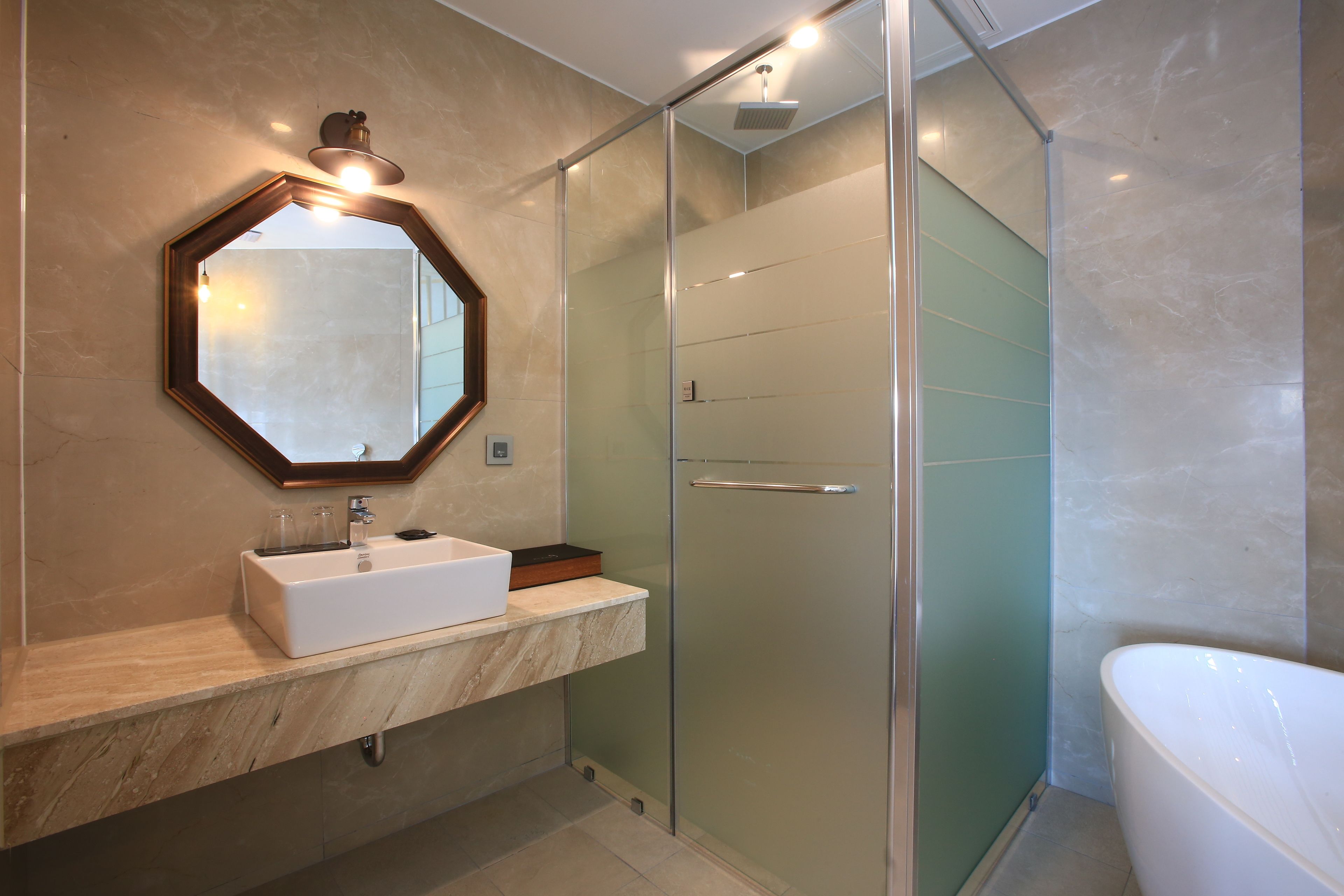 customized suite | bathroom | separate bathtub and shower, free toiletries, hair dryer, bathrobes