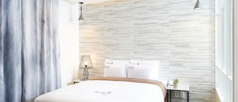 Desk, blackout curtains, free WiFi, bed sheets