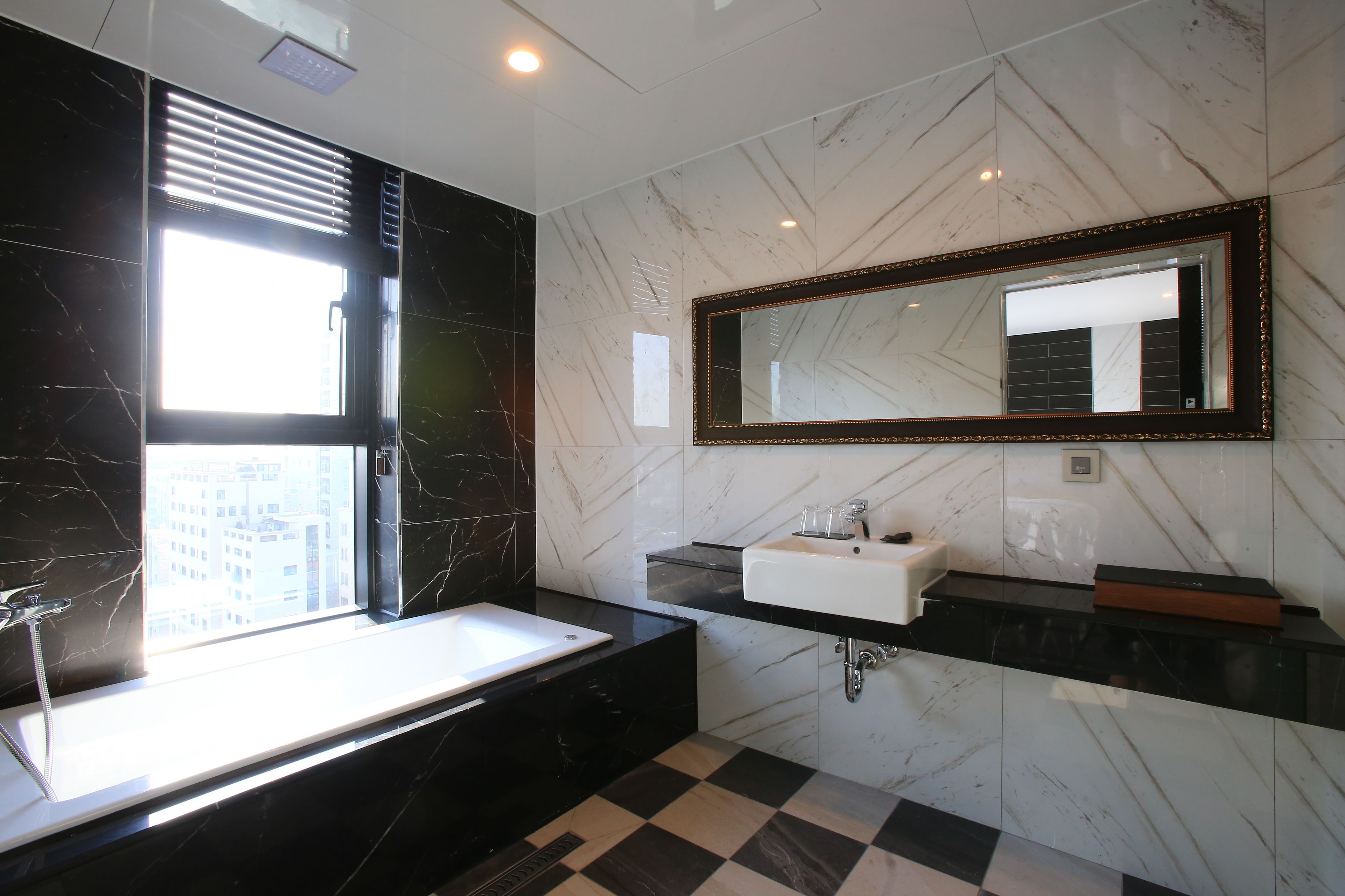 western suite | bathroom | separate bathtub and shower, free toiletries, hair dryer, bathrobes
