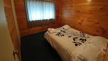 Deluxe Family Room | Premium bedding, desk, iron/ironing board, free WiFi