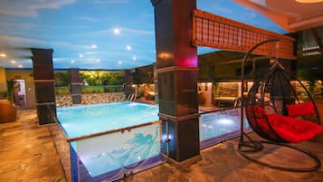 Indoor pool, open 8:00 AM to 8:00 PM, pool loungers
