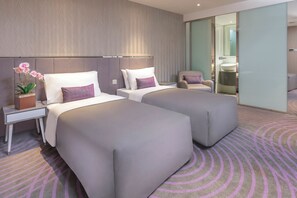 Habitación Premium con 2 camas individuales | Caja fuerte, tabla de planchar con plancha, wifi gratis y ropa de cama