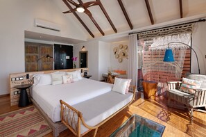 Ocean Water Villa | Minibar, in-room safe, desk, iron/ironing board