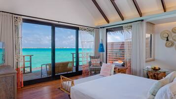 Lagoon Water Villa | Minibar, in-room safe, desk, iron/ironing board