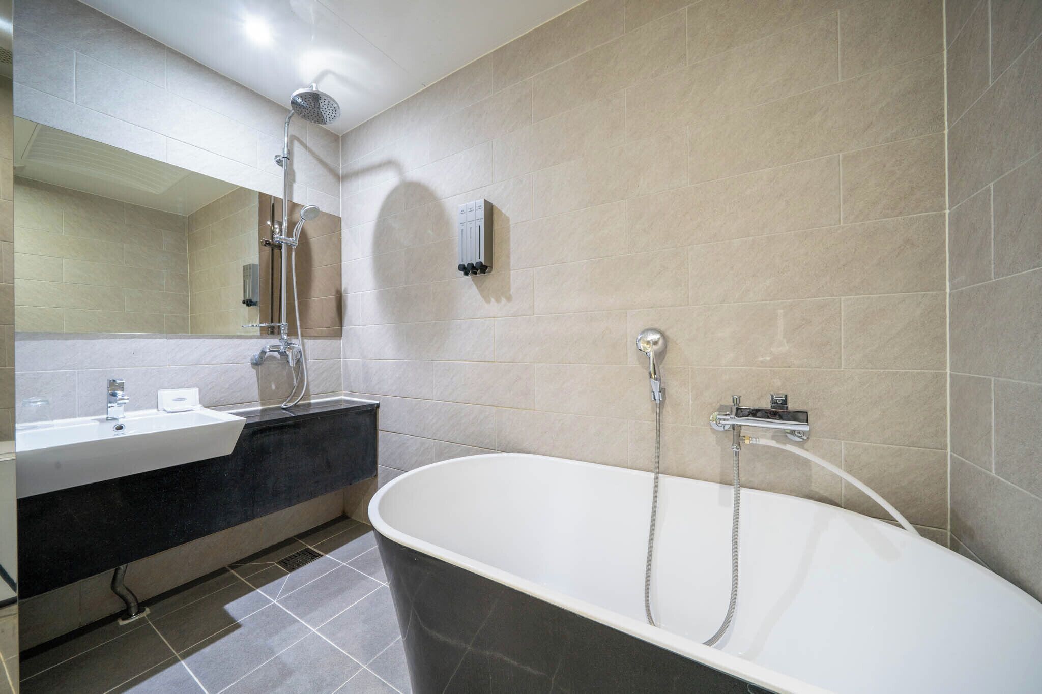 twin room | bathroom | free toiletries, hair dryer, slippers, soap