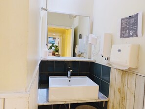 Basic Shared Dormitory, Women only | Bathroom | Shower, hair dryer, slippers, towels - Peking International Youth Hostel (Beijing)