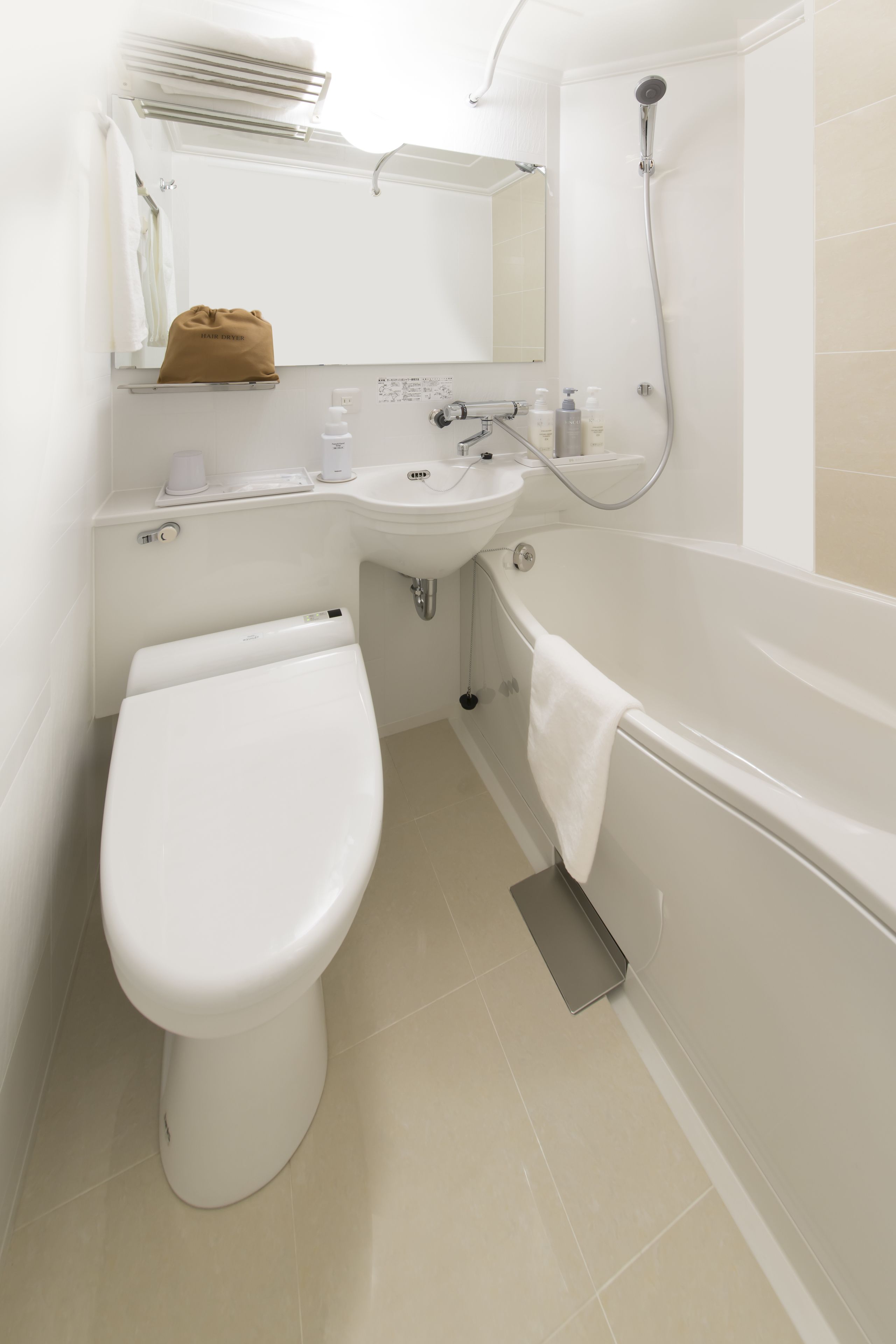 combined shower/bathtub, free toiletries, hair dryer, slippers