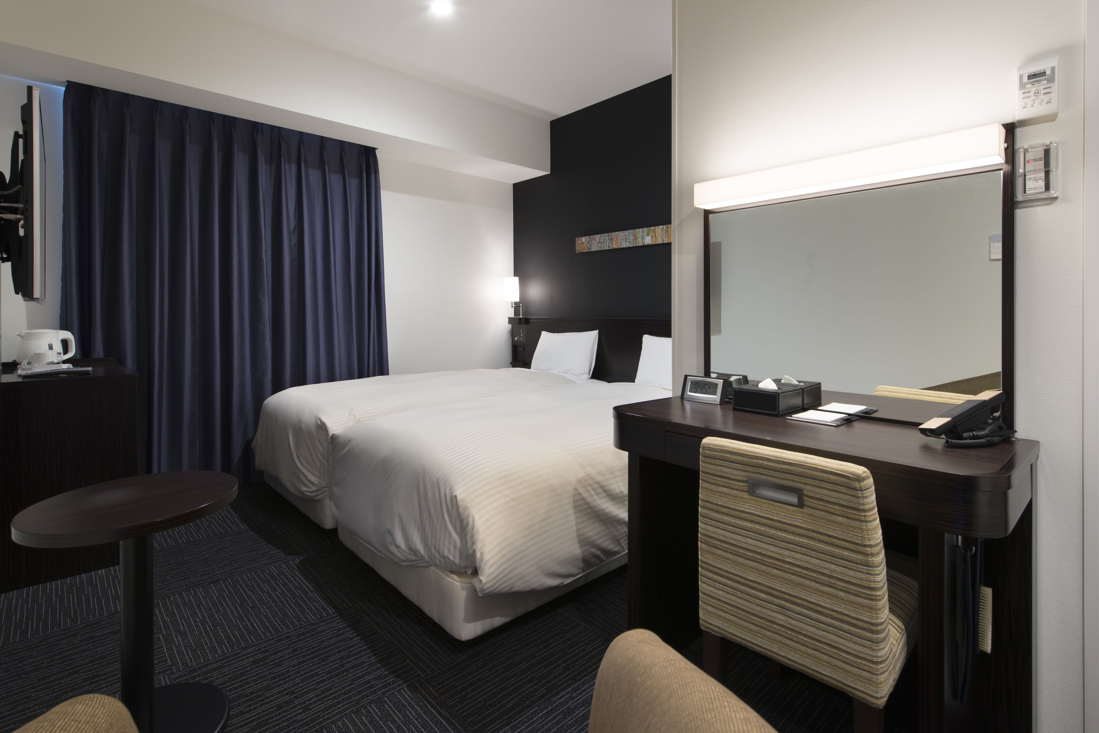 down duvets, pillow-top beds, in-room safe, desk