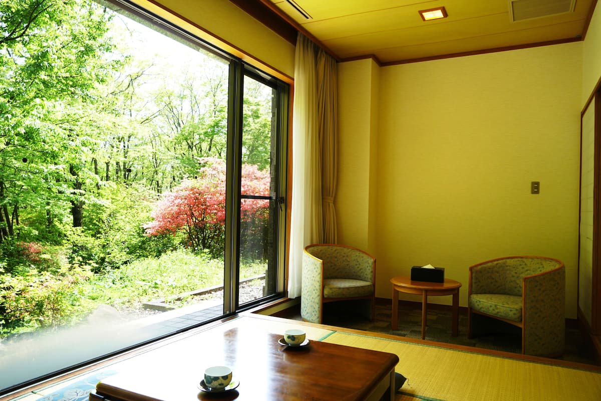 Suite, kamar mandi pribadi | Pemandangan dari kamar