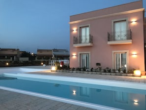 Outdoor pool, pool umbrellas, pool loungers