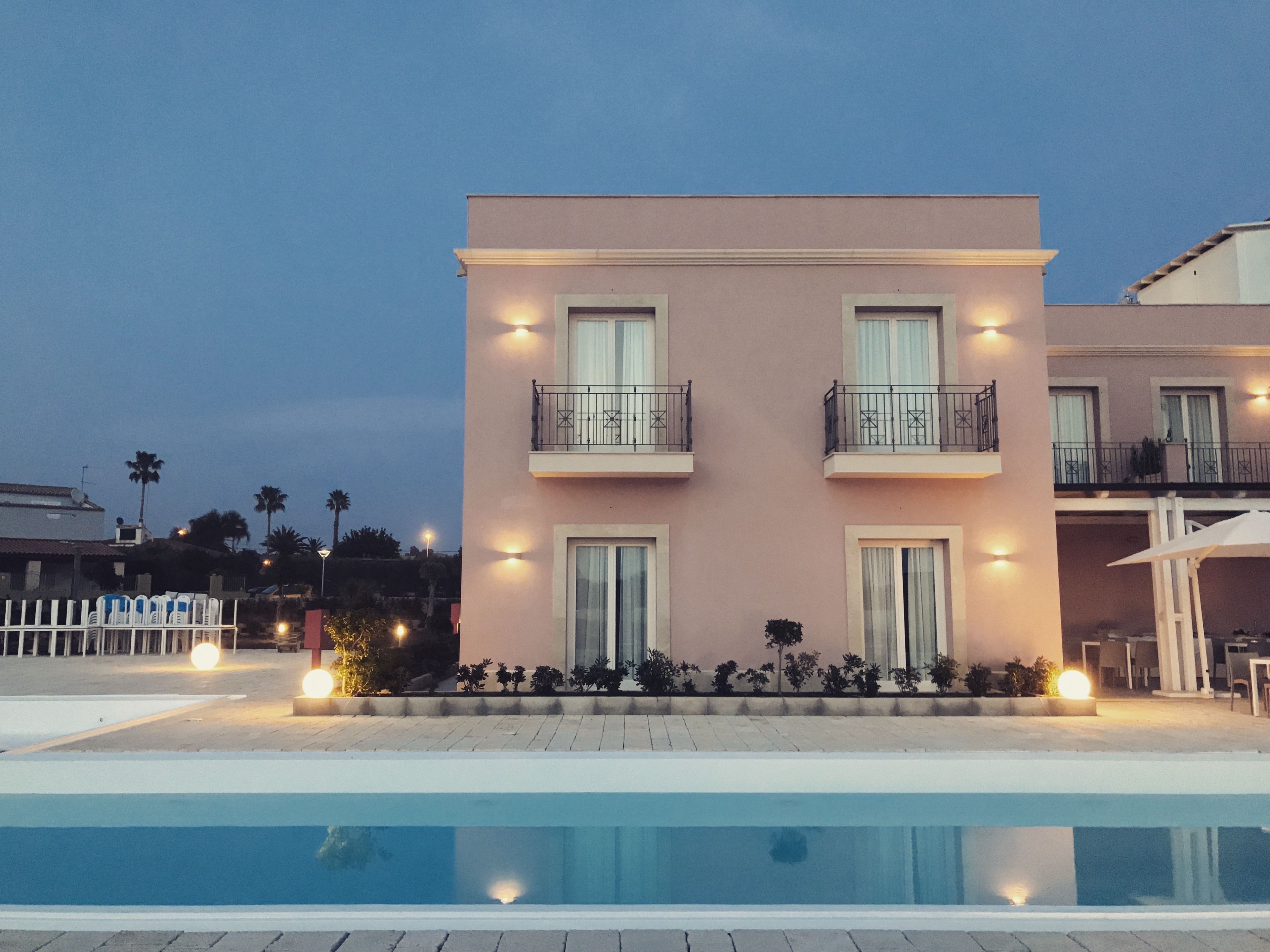 outdoor pool, pool umbrellas, pool loungers