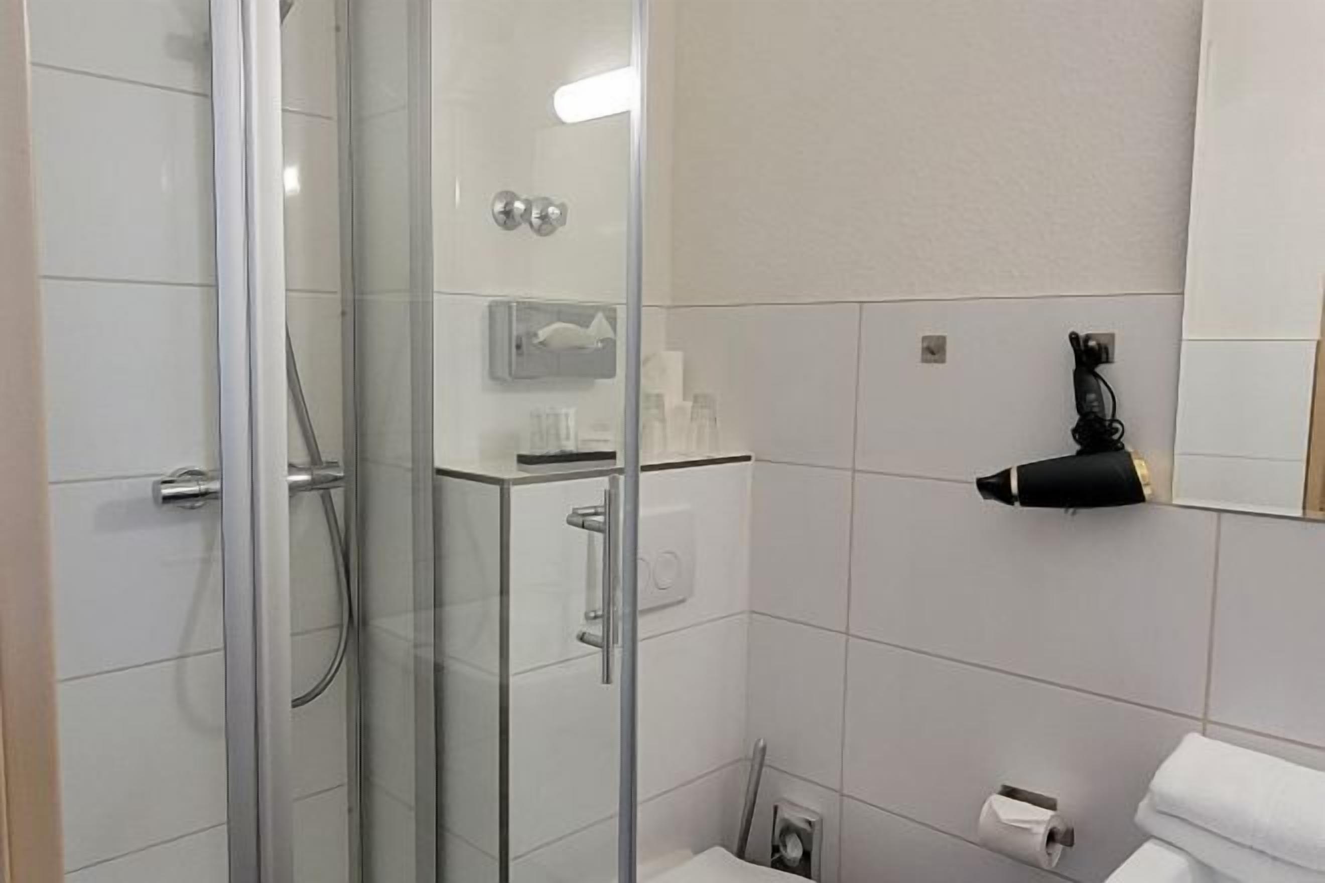 Shower, free toiletries, hair dryer, towels