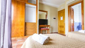 Desk, blackout curtains, free cots/infant beds, rollaway beds