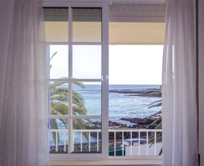Family Apartment, 2 Bedrooms, Ocean View, Beachfront | View from room - Porto Martins Bay Apartments (AL) (Praia da Vitoria)