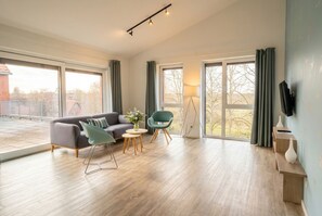Kattohuoneisto, 2 makuuhuonetta, terassi, jokinäköala (Kitchen) | Oleskelualue | Taulutelevisio