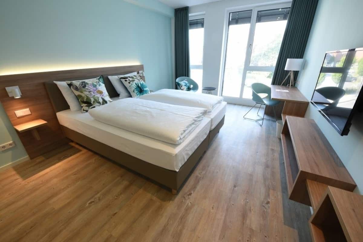 Double Room, City View | In-room safe, desk, soundproofing, cots/infant beds