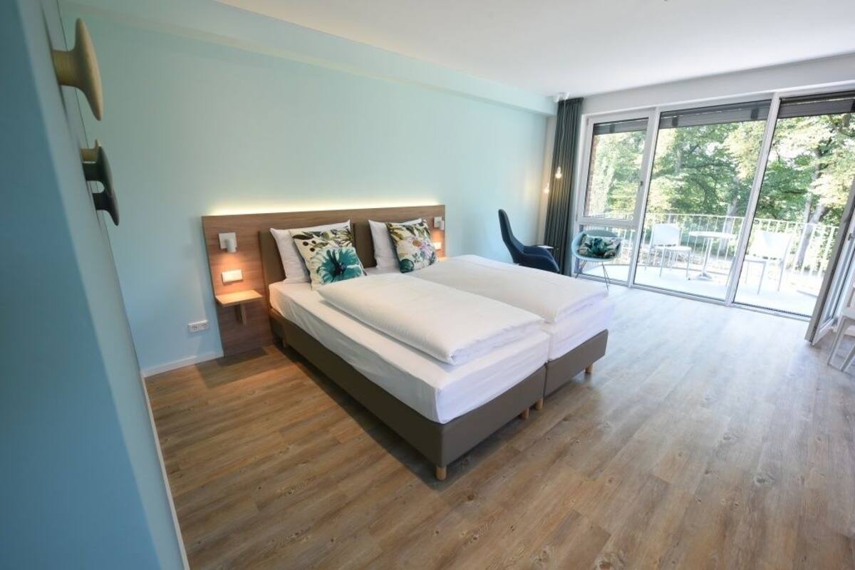 apartment, 1 bedroom, balcony, river view (kitchenette) | in-room safe, desk, soundproofing, cots/infant beds