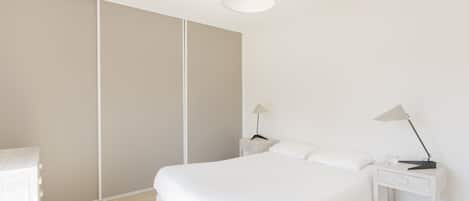 Premium bedding, blackout drapes, soundproofing, free WiFi