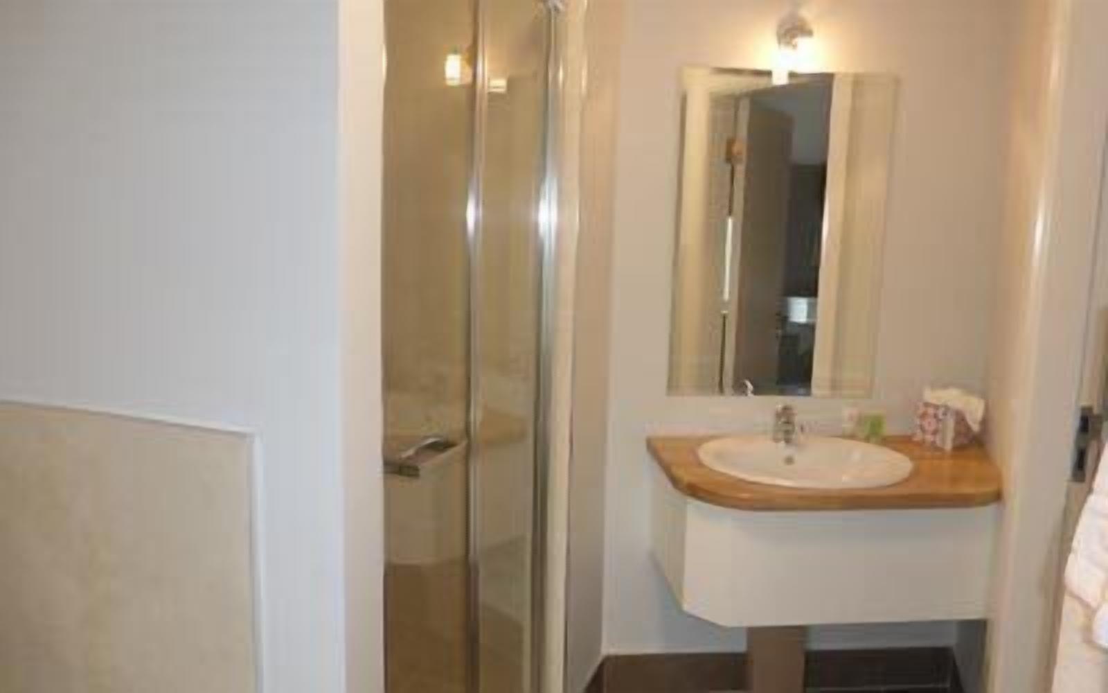 designer toiletries, hair dryer, towels