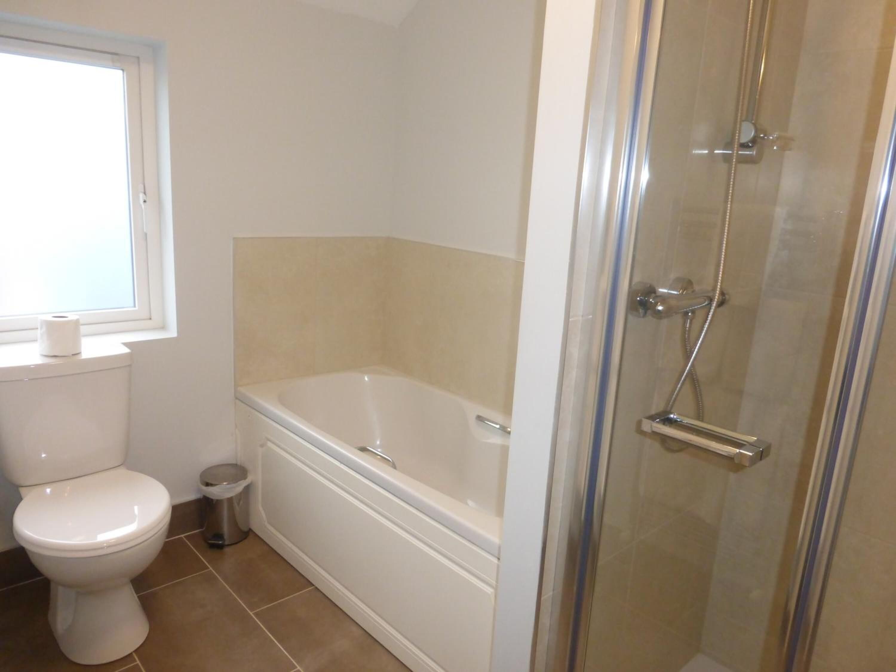 designer toiletries, hair dryer, towels