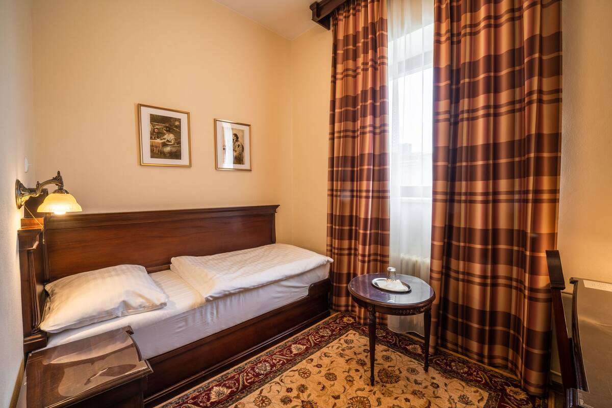 single room (small) | in-room safe, desk, blackout curtains, iron/ironing board