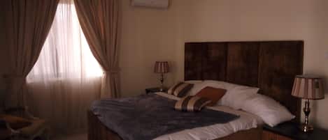 Apartment, 4 Bedrooms | 4 bedrooms, premium bedding, iron/ironing board, free rollaway beds