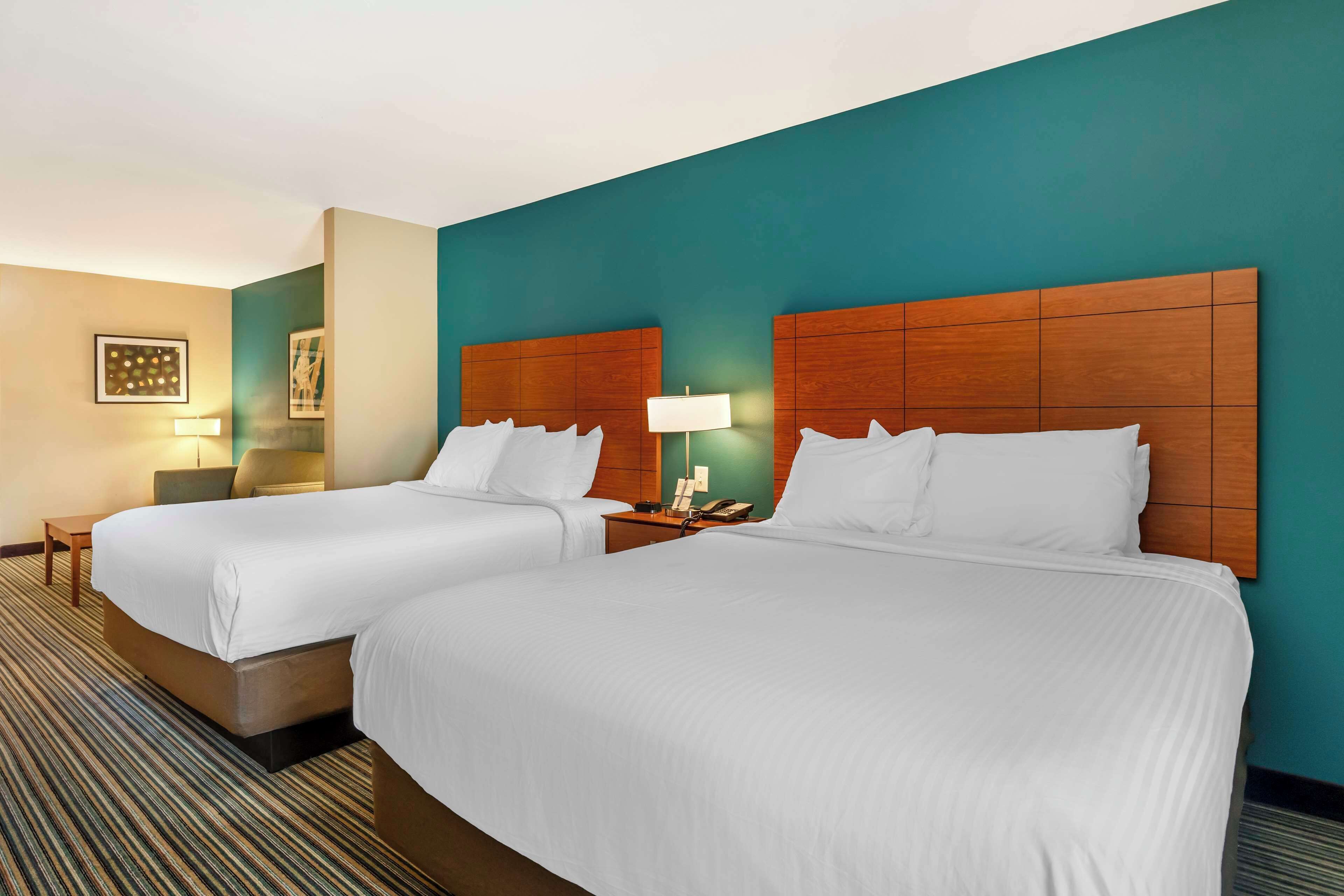 suite, 2 queen beds, non smoking, refrigerator & microwave (with sofabed) | premium bedding, in-room safe, desk, laptop workspace