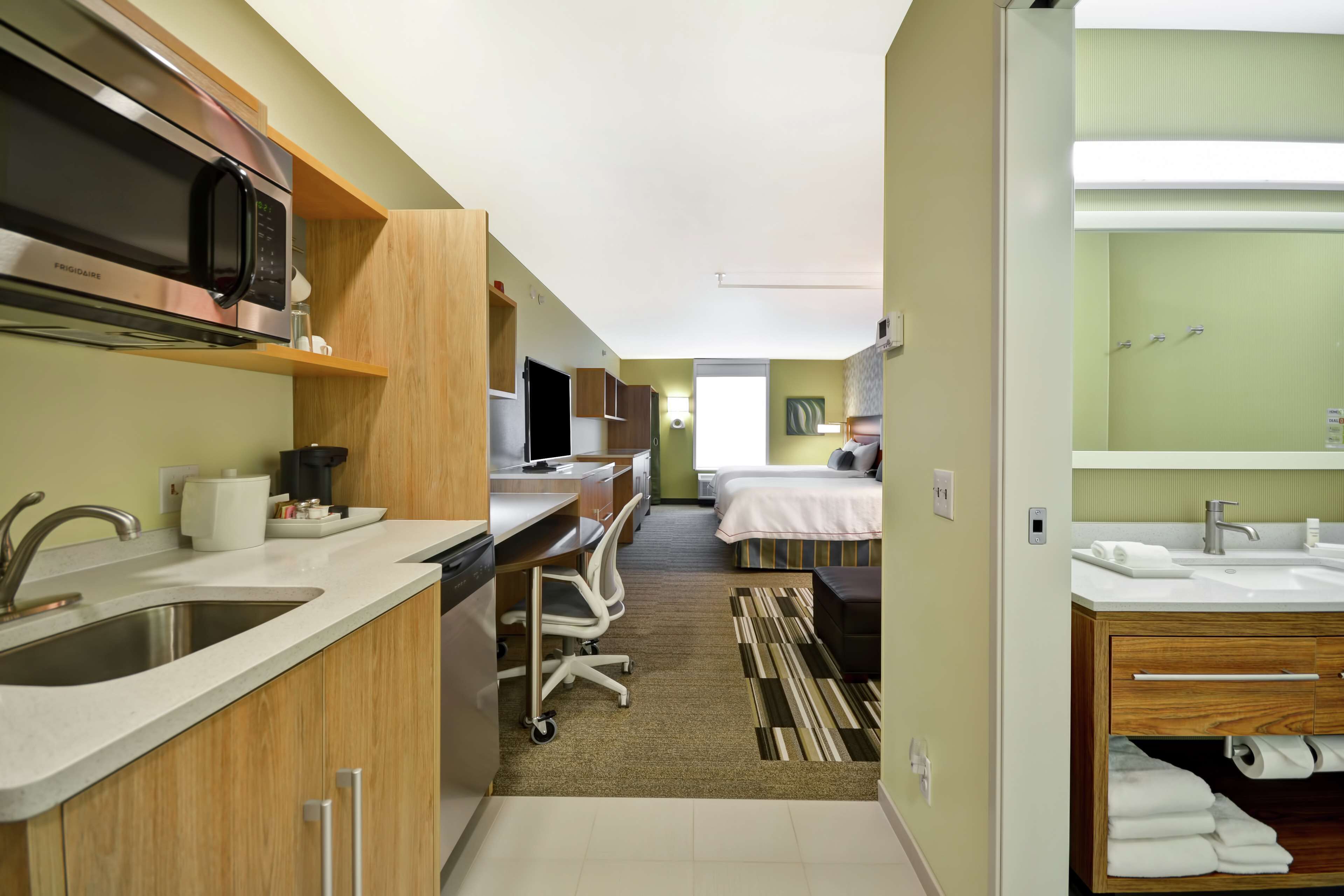 desk, blackout curtains, iron/ironing board, free cots/infant beds