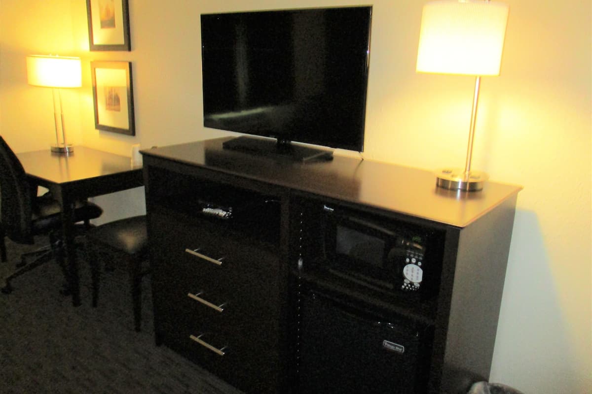 desk, blackout curtains, soundproofing, iron/ironing board