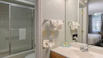 Combined shower/bathtub, deep-soaking bathtub, free toiletries, towels
