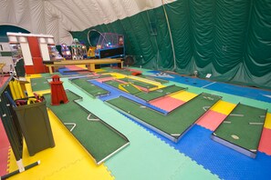 An indoor play area with various play structures and a tent-like enclosure. - Club Wyndham Smugglers’ Notch Vermont  (Jeffersonville)