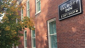 A brick building with a sign for 'Talbott Inn & Gift Shop'.