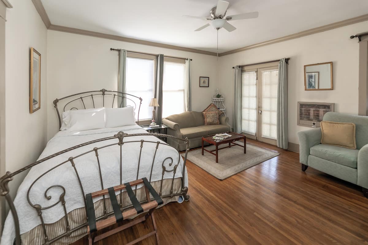 Deluxe Studio | Premium bedding, laptop workspace, blackout drapes, iron/ironing board