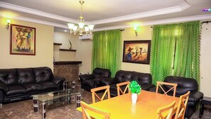 32-inch flat-screen TV with cable channels, TV - Dees Hotels, Apartments and Suites (Lagos)
