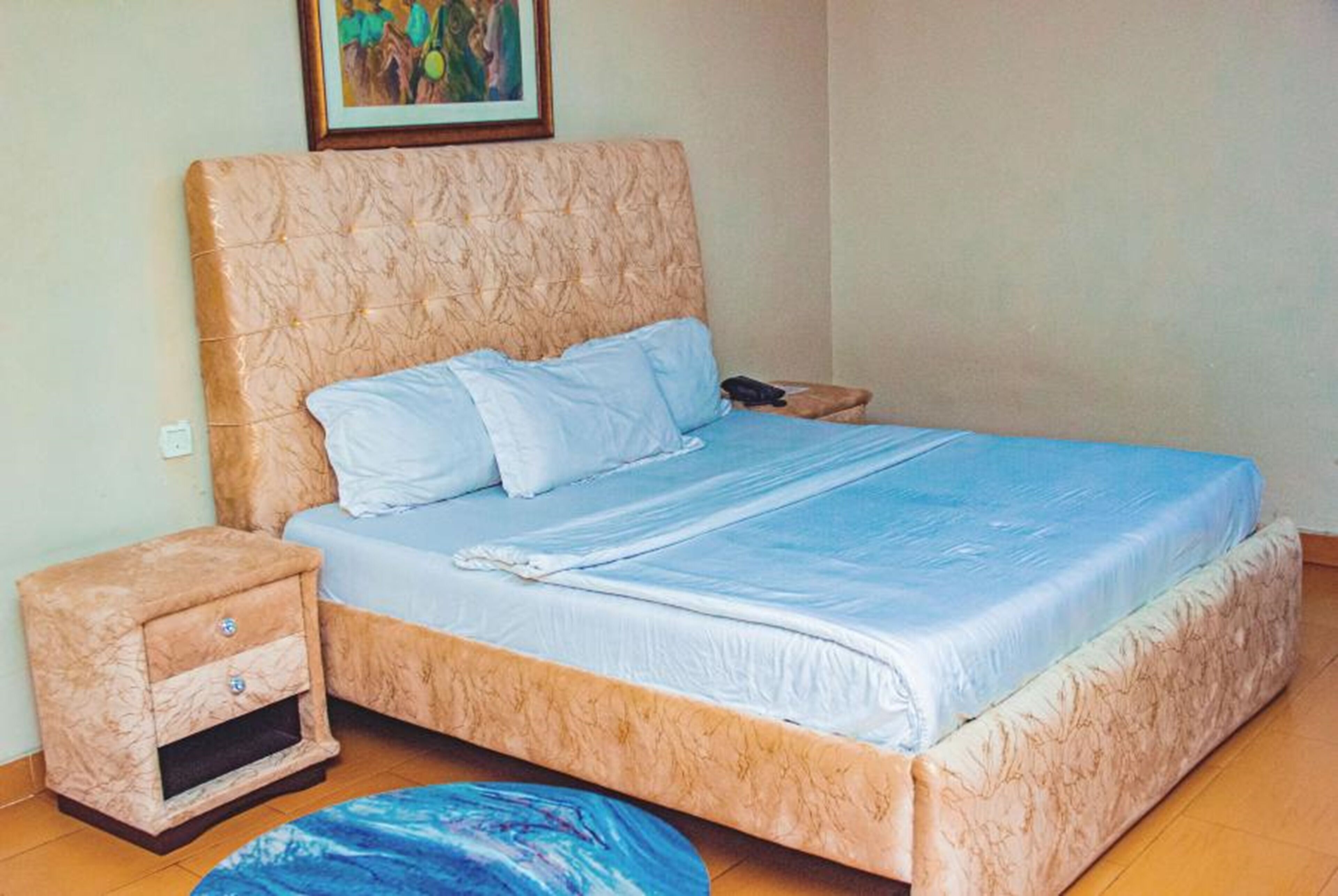 Desk, laptop workspace, bed sheets