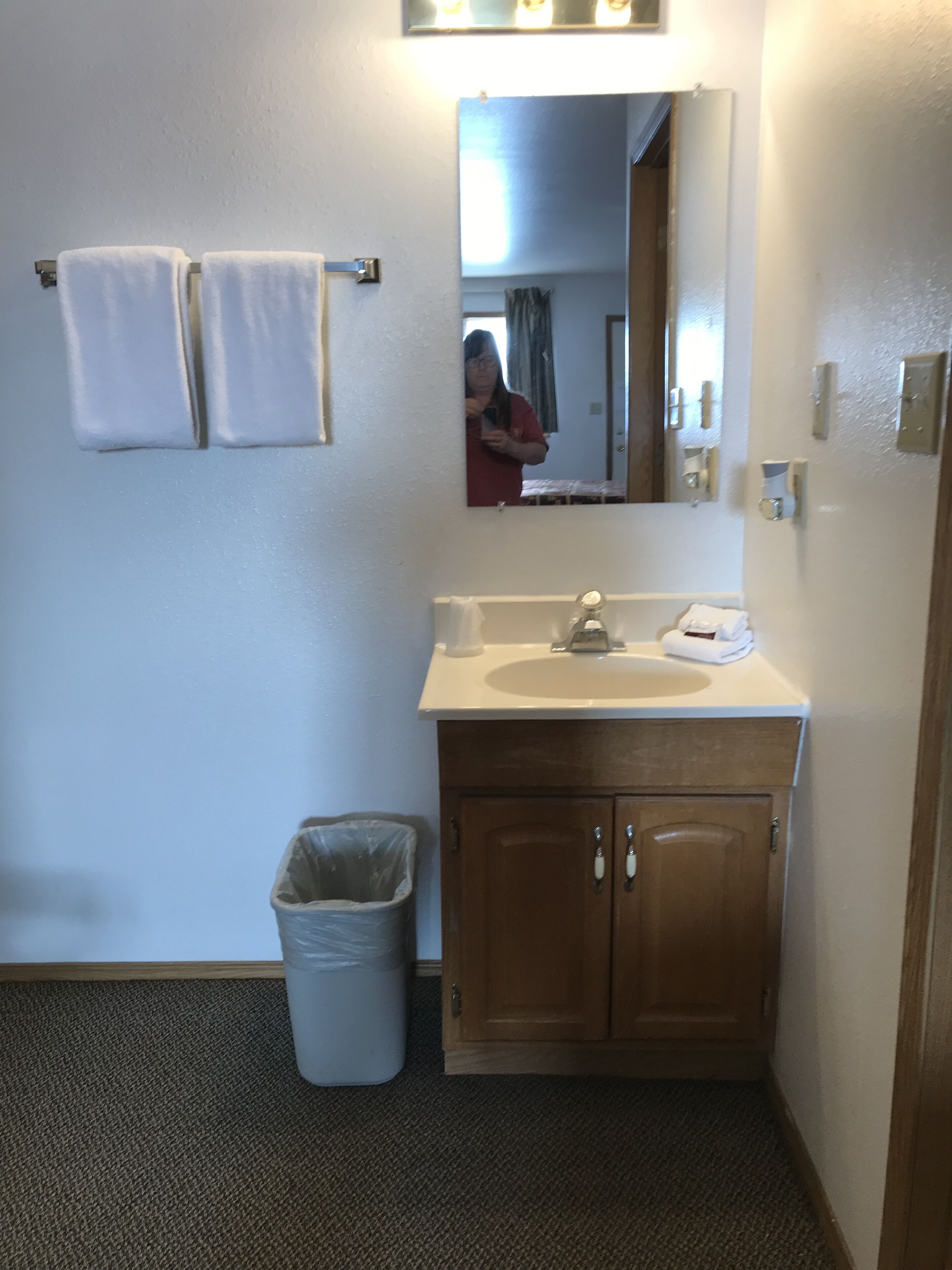 Combined shower/bathtub, towels, soap, shampoo