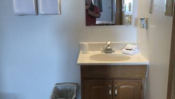 Combined shower/tub, towels, soap, shampoo