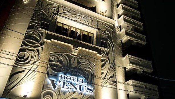 A hotel facade with a prominent 'Hotel Venus' sign, featuring classical architectural elements and decorative lighting. - Hotel venus NEO - Adults Only (Nagoya)