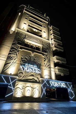 A hotel facade with a prominent 'Hotel Venus' sign, featuring classical architectural elements and decorative lighting. - Hotel venus NEO - Adults Only (Nagoya)