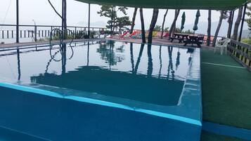 Seasonal outdoor pool, pool umbrellas, sun loungers