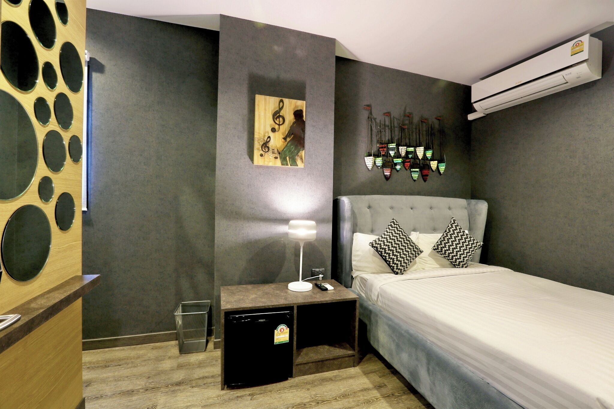 Family room, Share Bathroom | In-room safe, individually decorated, blackout drapes, free WiFi