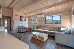 Deluxe Beachfront Villa, 3 Bedrooms | Living area | Flat-screen TV