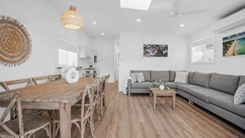 Deluxe Family Villa (3BR) | Living area | Flat-screen TV