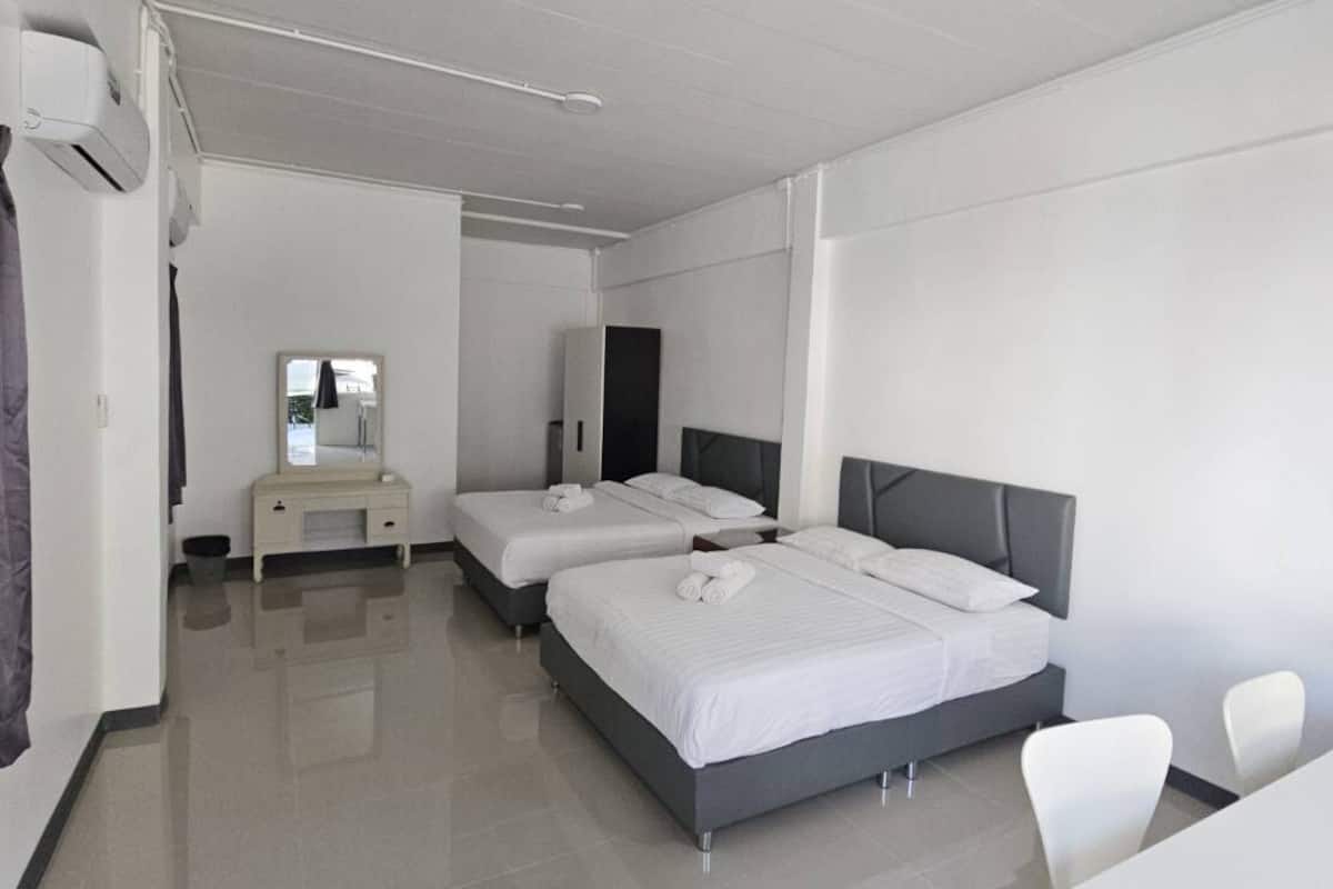 Habitación cuádruple Deluxe, 2 camas Queen size | Ropa de cama hipoalergénica, wifi gratis y ropa de cama