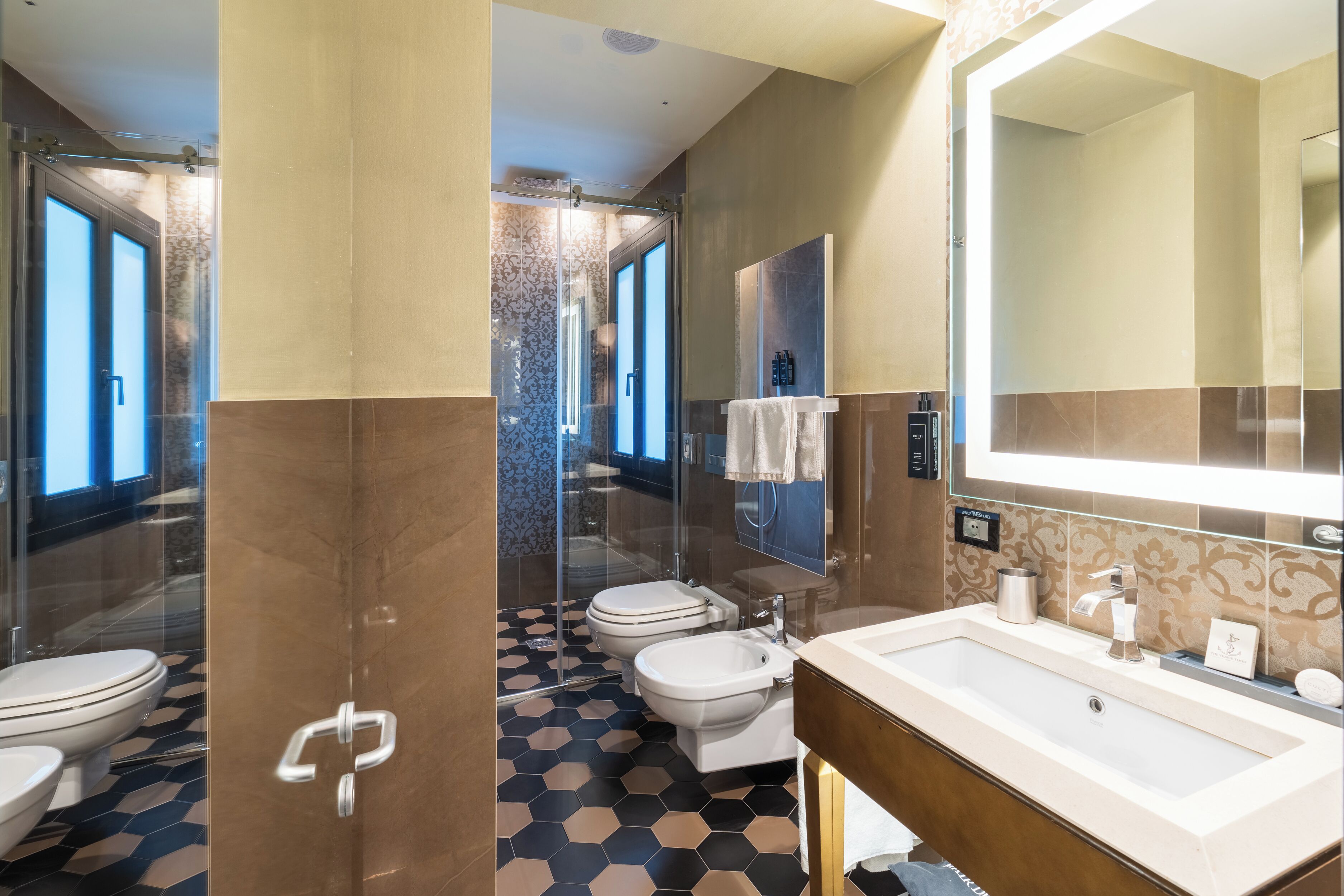 superior double room | bathroom | shower, free toiletries, hair dryer, towels