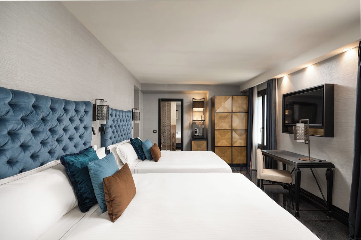 Premium Room, 2 Queen Beds | Premium bedding, down comforters, in-room safe, blackout drapes
